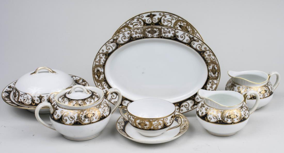 Noritake Porcelain Dinner Service: Approxiamtely nintey six pieces, pattern number 20056, comprising twenty salad/luncheon plates, twelve dessert plates, twelve fruit bowls, eight cups, eleven saucers, eleven cream soup bowls, thirteen