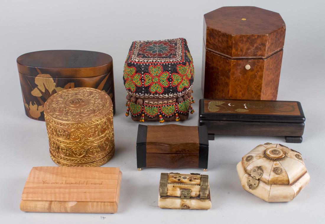 Group of Decorative Boxes: Including burl wood, bone, beaded, etc. Various sizes. Notice to bidders: Condition reports and additional photographs are provided by request as a courtesy to our clients, as such any condition repor