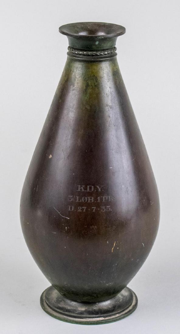 Just Andersen Bronze Vase: Baluster form with circular base, monogrammed "KDY / 3 LOB 1 PR / D. 27-7-35", marked on the bottom. Height 11 1/2 inches. Notice to bidders: Condition reports and additional photographs are provided