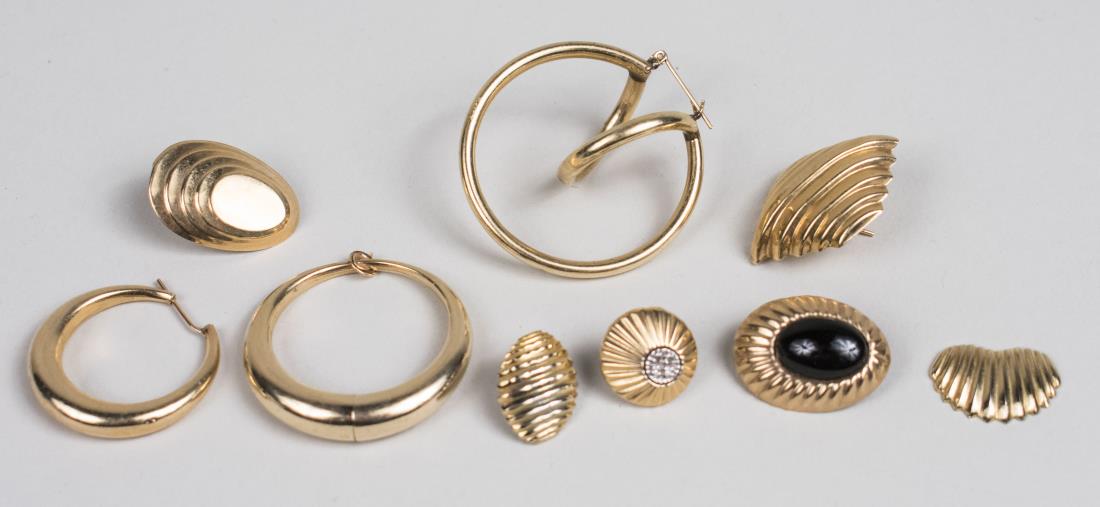 Gold Scrap: 14k yellow gold, odd earrings. Total 21.1 grams. Notice to bidders: Condition reports and additional photographs are provided by request as a courtesy to our clients, as such any condition report is o