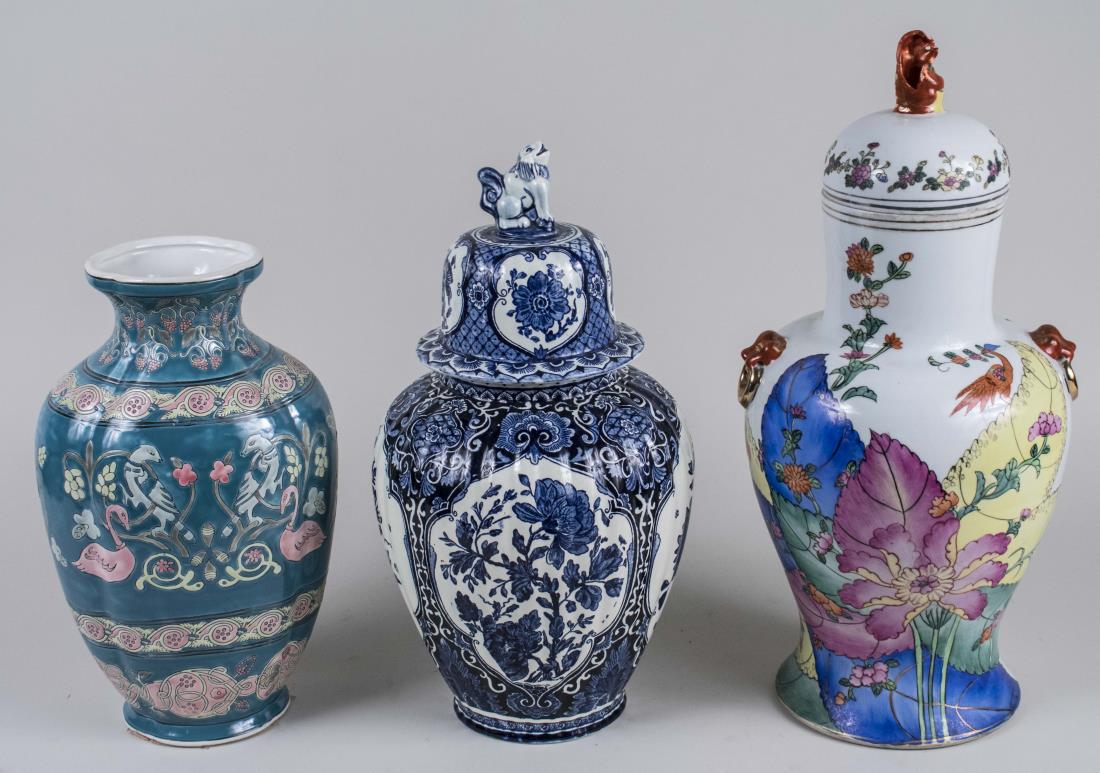 Two Asian Vases and a Ginger Jar: Tobacco Leaf covered vase, blue and white ginger jar, and an ovoid vase. Tallest, height 17 3/4 inches. Notice to bidders: Condition reports and additional photographs are provided by request as a cou