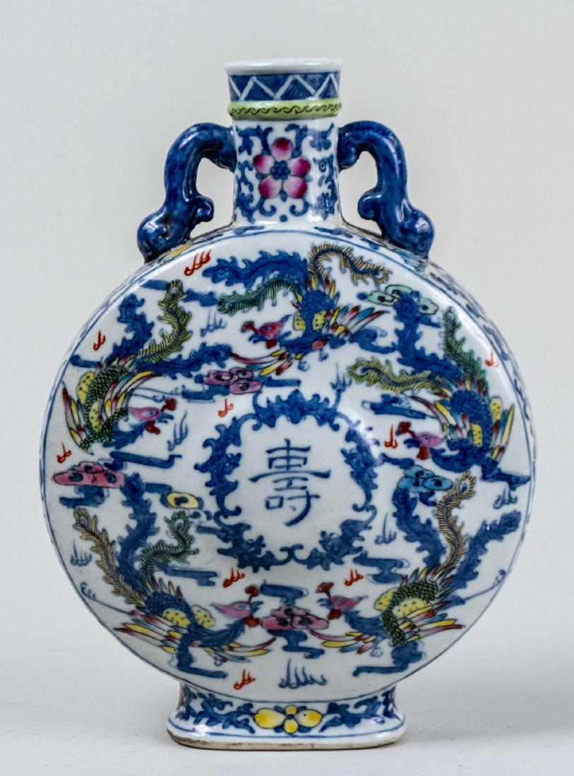 Chinese Blue and White Porcelain Moon Flask Vase: Of typical form, with two scroll handles, polychrome phoenix and dragon decoration, signed. Height 11 1/2 inches. Notice to bidders: Condition reports and additional photographs are provided by reques