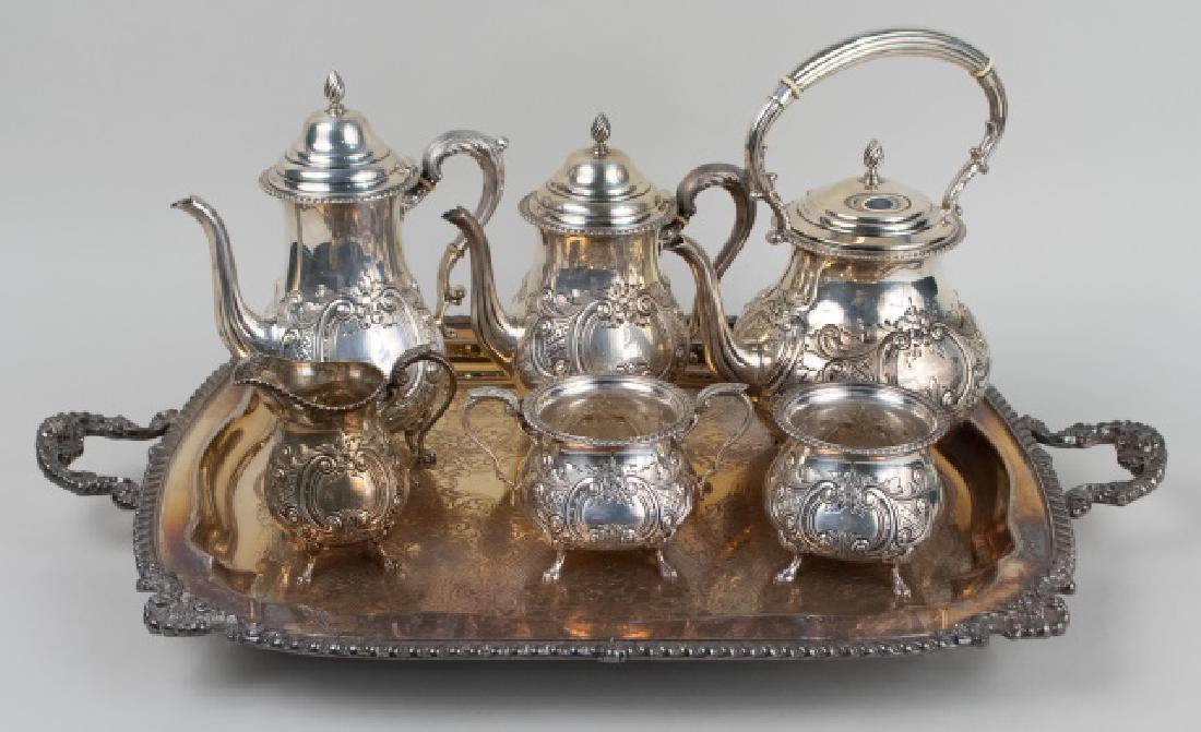 American Sterling Silver Coffee and Tea Service: Comprising a kettle on stand, coffee pot, teapot, milk jug, open sugar and waste bowl. Kettle, height over handle, 11 1/2 inches. total 4000 grams. Notice to bidders: Condition reports and additional 
