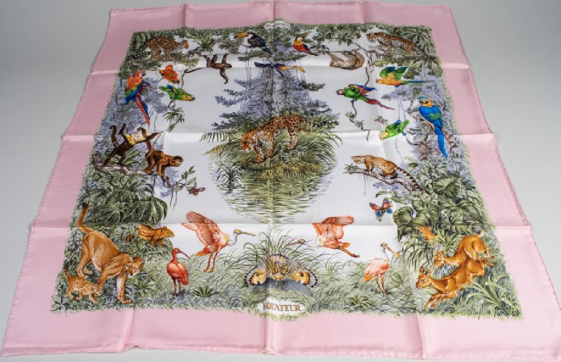 Hermes Equateur Silk Scarf: Designed by artist Robert Dallet and features jungle flora and fauna, with tropical birds, butterflies, leopards, monkeys and other exotic creatures, pink border. 35 x 35 inches. Notice to bidders: Co