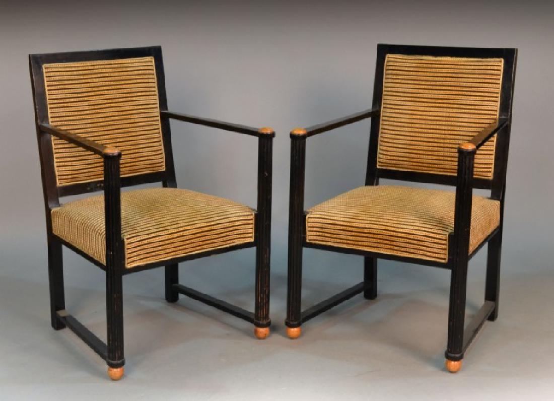 Set of Three Art Deco Painted Armchairs: Black painted chairs with open arms and striped velour upholstery. Height 37 inches, width 24 inches, depth 24 inches. Notice to bidders: Condition reports and additional photographs are provided by r