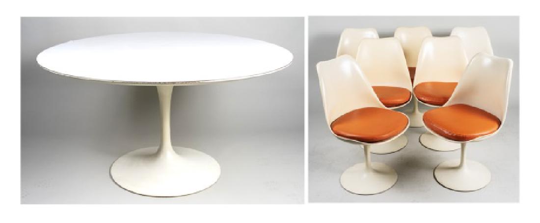 Eero Saarenin Tulip Table and Seven Chairs: the white painted table, with circular top (as is), on a pedestal base with spread foot, the chairs with molded seat with orange vinyl upholstered cushions, on similar pedestal bases with spread foot.