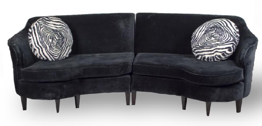 Black Two Piece Sectional Sofa: Reniform shaped sofa with black velvet upholstery, square tapered legs. Height 33 inches, width 91 inches, depth 41 inches. Notice to bidders: Condition reports and additional photographs are provided