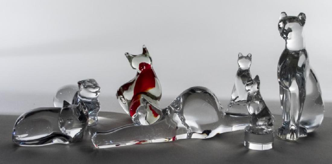 Group of Crystal Cat Figurines: Various makers and styles, including Baccarat, Hoya, Val St. Lambert, Steuben, etc. Tallest, height 6 1/4 inches. Notice to bidders: Condition reports and additional photographs are provided by reques