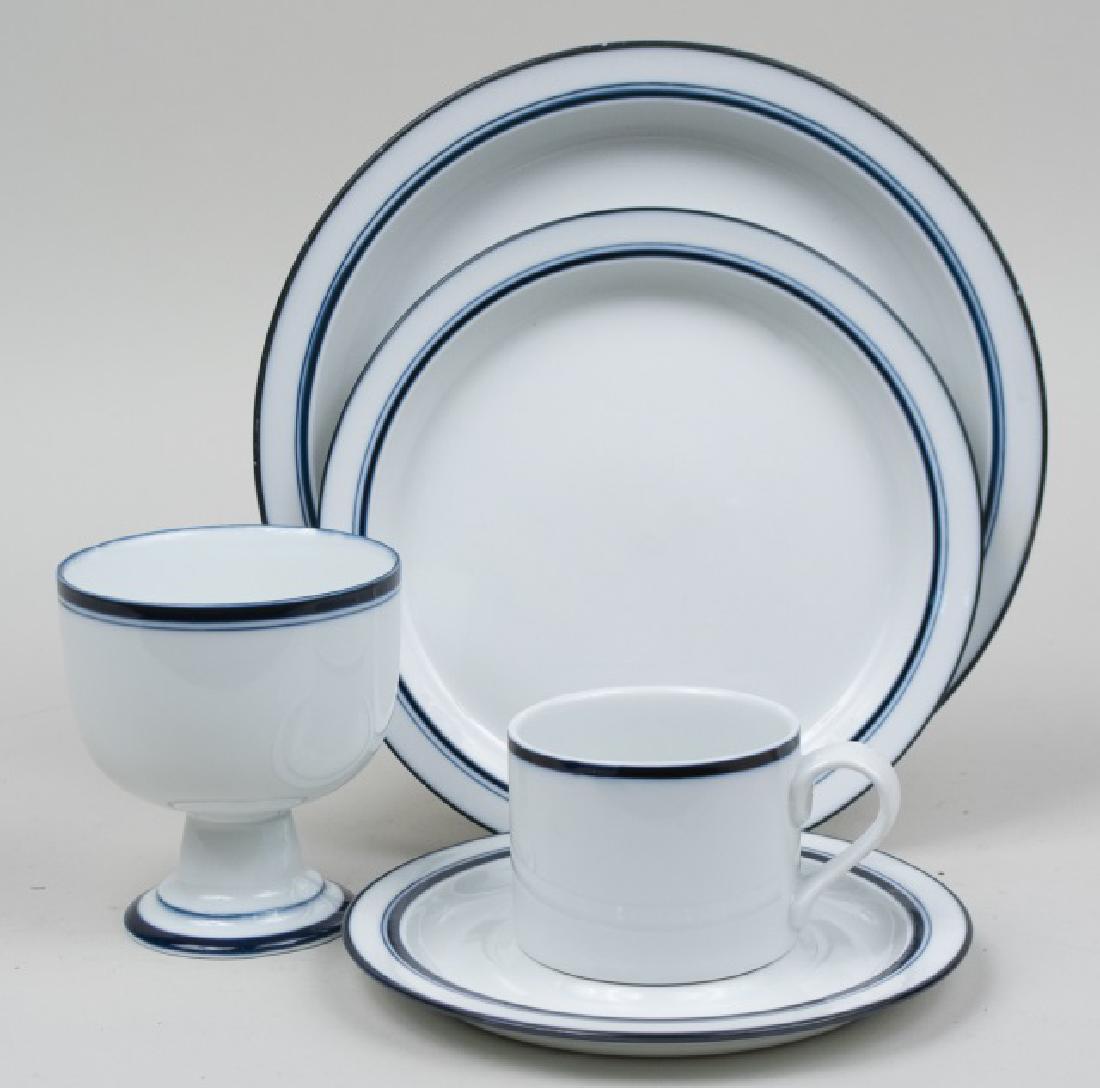 Dansk Bistro Porcelain Dinner Service: Approximately forty five pieces, comprising nine dinner plates, seven salad plates, seven pedestal bowls, eleven cups, and twelve saucers. Dinner plate, diameter 10 3/8 inches. Notice to bidders: Cond