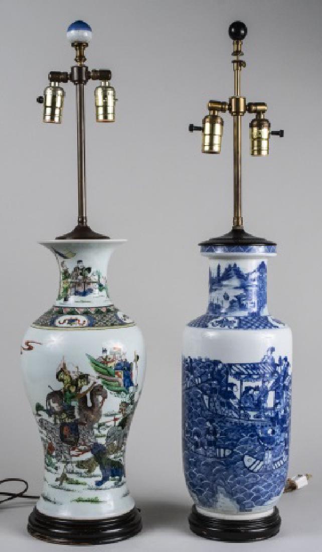 Two Chinese Porcelain Table Lamps: Both a two light lamp with Asian motif. Larger, base height 19 1/4 inches. Notice to bidders: Condition reports and additional photographs are provided by request as a courtesy to our clients, as such