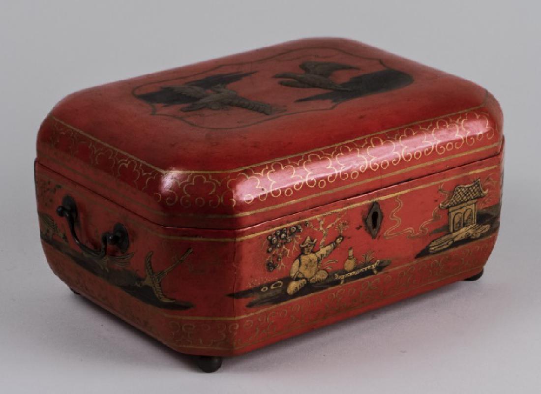 Red Lacquer Tea Caddy: Two tin tea bins. Height 5 1/2 inches. Notice to bidders: Condition reports and additional photographs are provided by request as a courtesy to our clients, as such any condition report is only an opi