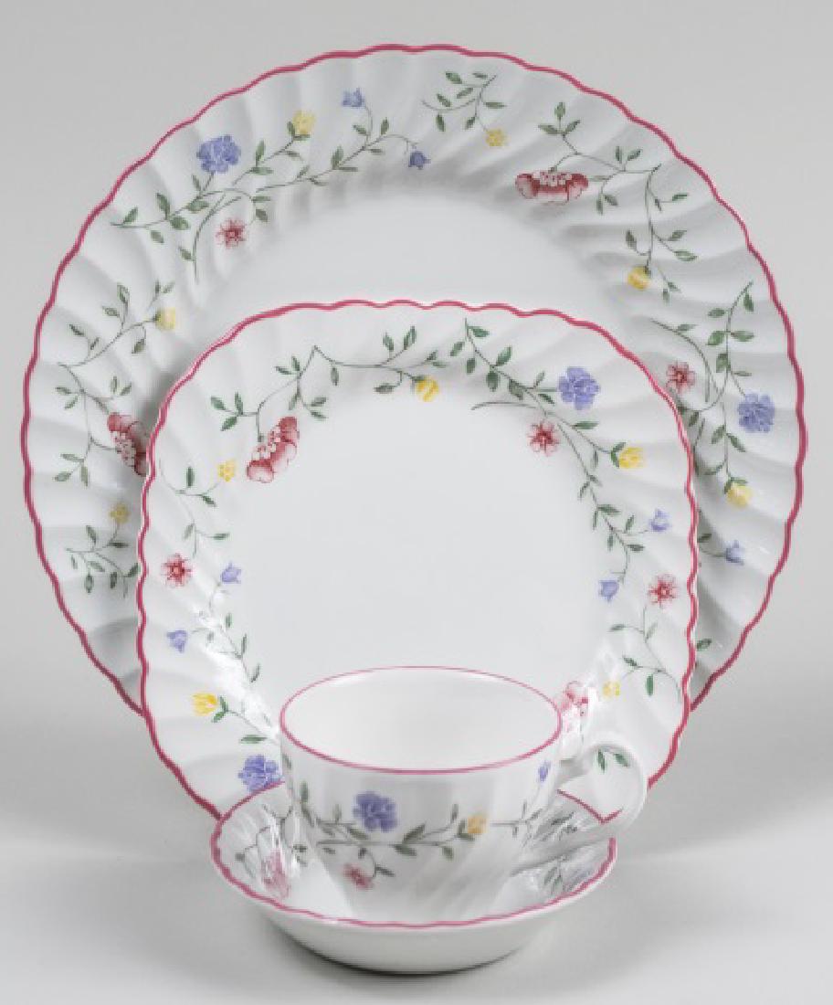Johnson Brothers Porcelain Dinner Service: Approximately thirty three pieces, floral pattern, comprising four dinner plates, three square salad plates, four bread plates, six bowls, four fruit bowls, six saucers, and six cups; together with an