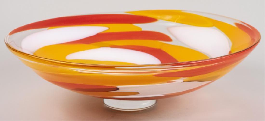 Abby Modell Art Glass Low Swirl Bowl *: Orange and white swirl decoration Height 6 inches, diameter 19 inches Notice to bidders: Condition reports and additional photographs are provided by request as a courtesy to our clients, as such any