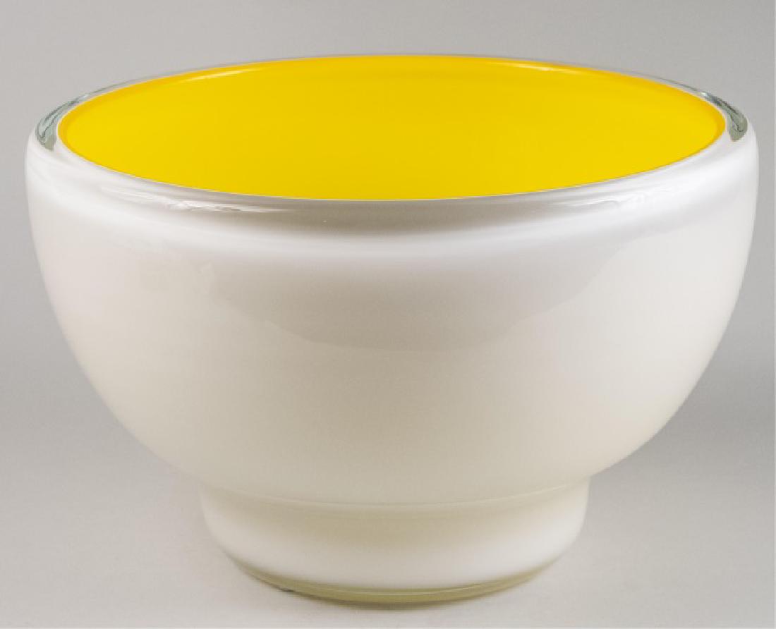 Abby Modell Hand-Blown Art Glass Overlay Bowl *: Yellow and white glass Height 8 1/4 inches, diameter 12 1/2 inches Notice to bidders: Condition reports and additional photographs are provided by request as a courtesy to our clients, as such any con