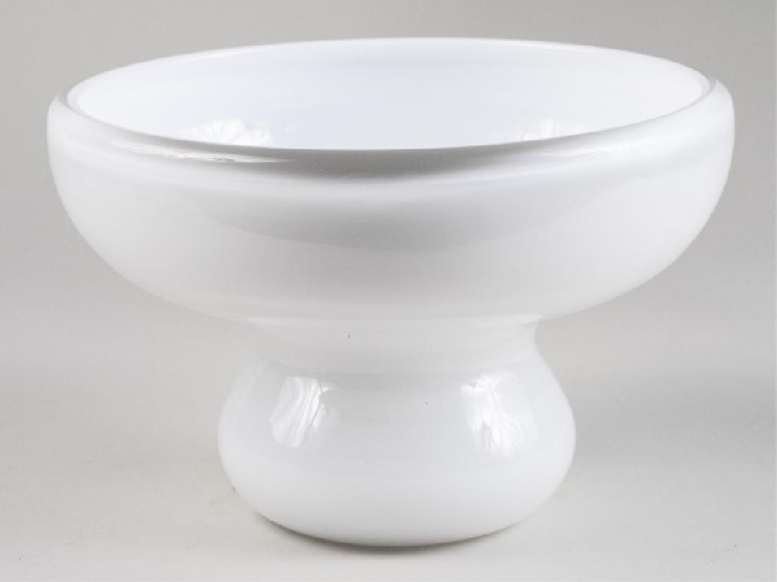Abby Modell Hand-Blown Art Glass Cloud Bowl *: White shaped glass Height 7 inches, diameter 10 inches Notice to bidders: Condition reports and additional photographs are provided by request as a courtesy to our clients, as such any condition repor