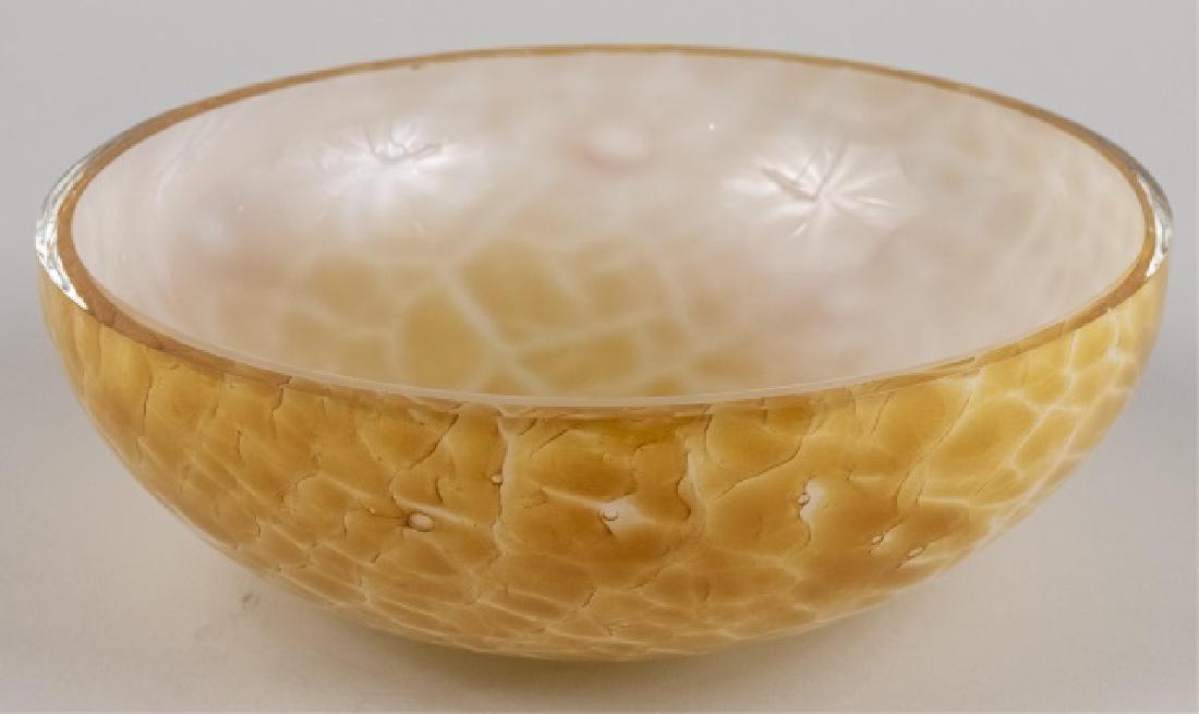 Abby Modell Hand-Blown Art Glass Giraffe Bowl *: Orange and yellow speckled decoration Height 3 1/2 inches, diameter 10 inches Notice to bidders: Condition reports and additional photographs are provided by request as a courtesy to our clients, as s