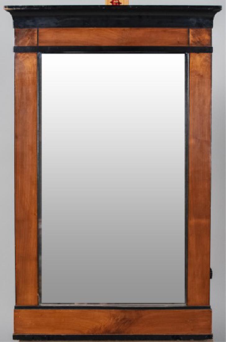 Biedermeier Style Mirror: Moulded top over a rectangular mirror plate Height 37 inches, width 24 inches Notice to bidders: Condition reports and additional photographs are provided by request as a courtesy to our clients, as s