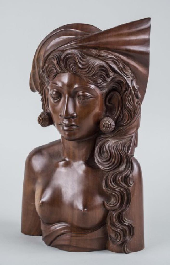 Bust of an Indonesian Woman: Carved wooden bust of an Indonesian woman, 20th century Signed on underside Klung Kung, Bali Indonesia Height 14 inches Notice to bidders: Condition reports and additional photographs are provided by 
