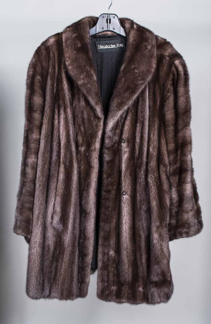 Ladys Mink Coat: 3/4 length Size medium Notice to bidders: Condition reports and additional photographs are provided by request as a courtesy to our clients, as such any condition report is only an opinion and should