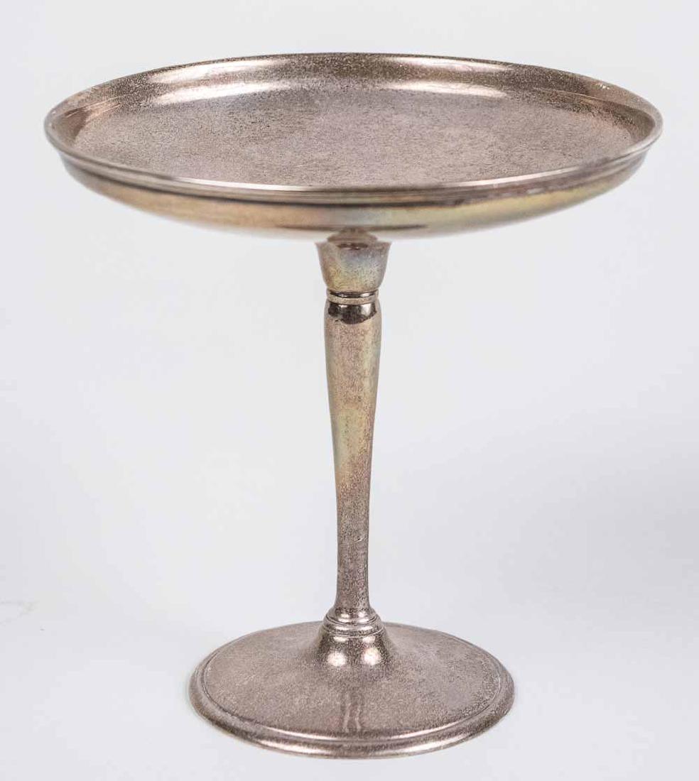 Tiffany & Co, Sterling Silver Compote: Circular with pedestal base. signed on the bottom. Height 5 3/4 inches, 275 grams. Provenance: From the Estate of Robert Sauers of New York and Philadelphia. Notice to bidders: Condition reports and a