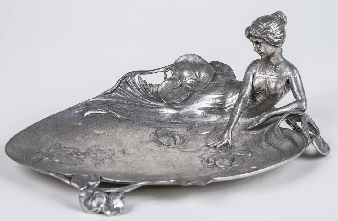 Art Nouveau Pewter Vide Poche: Modeled a reclining female in a flowing bathing gown in a shallow pool with lily pads. Height 4 inches, length 10 inches. Provenance: From the Estate of Robert Sauers of New York and Philadelphia. Not