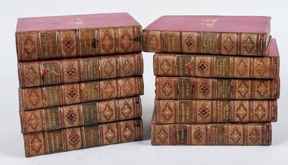 The Works of William Makepeace Thackeray: Published by Smith, Elder & Co., 15, Waterloo Place, London, 1872, ten of twelve volumes, with full red leather binding, gilt hound and stag decorated covers, and gilt lettering on the spines. Notice 