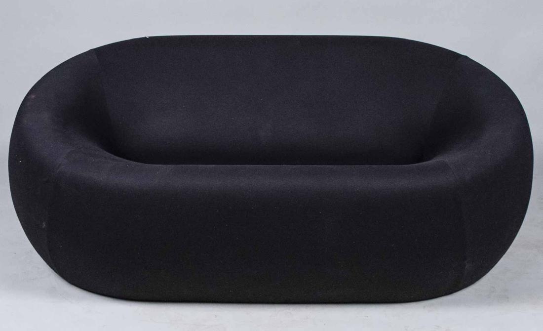 Gaetano Pesce for B & B Italia Black Childs Sofa: Height 28 inches, length 64 inches, depth 40 inches. Notice to bidders: Condition reports and additional photographs are provided by request as a courtesy to our clients, as such any condition report 