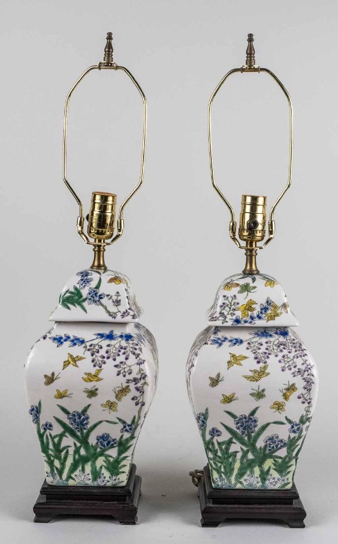 Pair of Chinese Porcelain Table Lamps: Single light jar form lamps decorated with polychome birds and flowers. Base, height 12 1/2 inches. Notice to bidders: Condition reports and additional photographs are provided by request as a courtes