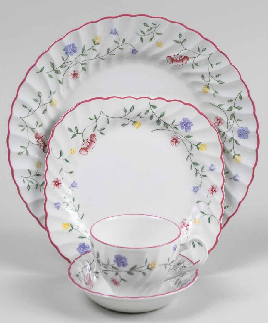 Johnson Brothers Porcelain Dinner Service: Approximately thirty three pieces, floral pattern, comprising four dinner plates, three square salad plates, four bread plates, six bowls, four fruit bowls, six saucers, and six cups; together with an