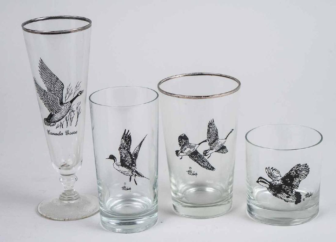 Pheasant Glassware: Including parfait, highball, tumbler and old fashioned glasses; together with four associated glass coasters. Tallest, height 8 1/4 inches. Provenance: From the Estate of Robert Sauers of New York and