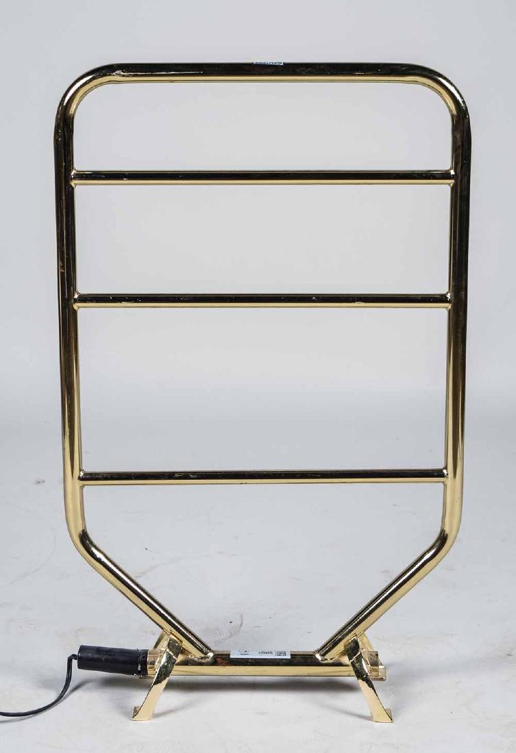 Brass Towel Warmer: Three towel holder bars on a stand. Height 34 inches, width 20 inches. Notice to bidders: Condition reports and additional photographs are provided by request as a courtesy to our clients, as such any
