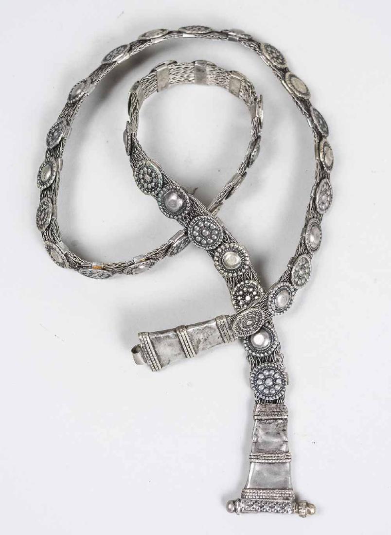 Nepalese Silver Belt: Length 32 inches. Notice to bidders: Condition reports and additional photographs are provided by request as a courtesy to our clients, as such any condition report is only an opinion and should not b