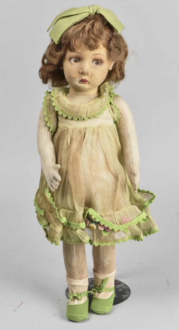 Lenci Style Doll: Felt doll with painted face, wearing a pale green chiffon dress and matching shoes. Height 19 inches. Notice to bidders: Condition reports and additional photographs are provided by request as a court
