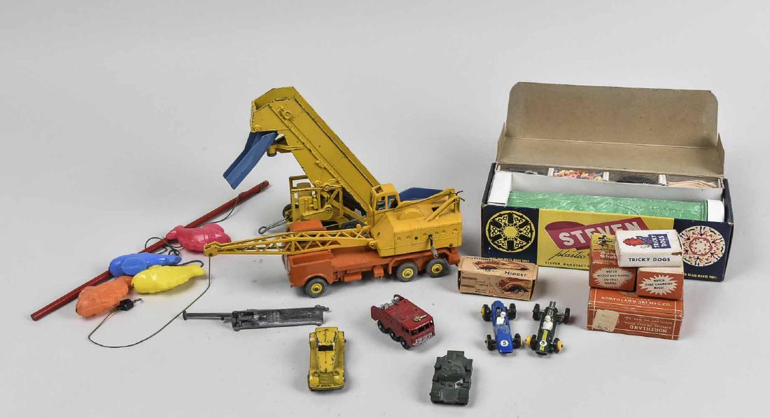 Group of Vintage Toys: Including a build your own Kaleidoscope kit, di-cast cars and construction vehicles, a fishing game, etc. Various sizes. Notice to bidders: Condition reports and additional photographs are provided by