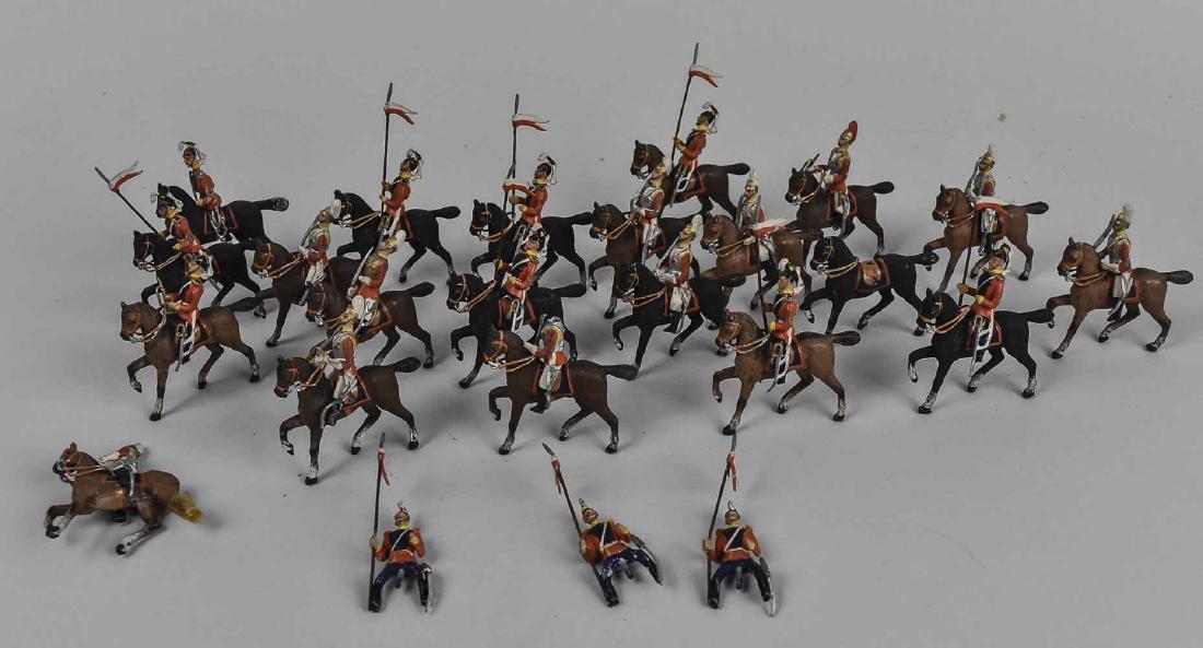 Group of Lead Soldiers: Approximately forty four pieces, mounted cavalry (two riders without horses), unmarked. Notice to bidders: Condition reports and additional photographs are provided by request as a courtesy to our cli