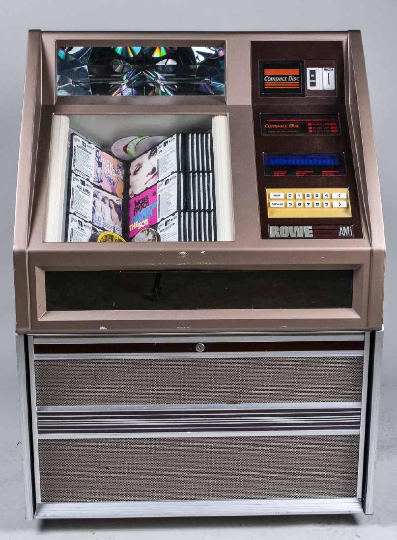 Rowe AMI Compact Disc Juke Box: Model CD-51A, serial number 14479. Height 50 inches, width 35 inches, depth 25 inches. Notice to bidders: Condition reports and additional photographs are provided by request as a courtesy to our clie