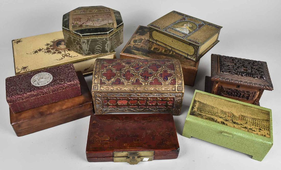 Group of Decorative Boxes: Various styles including carved wood, tin, fabric and leather boxes. Carved wood box, height 5 inches, width 6 1/4 inches, depth 5 3/4 inches. Notice to bidders: Condition reports and additional photo