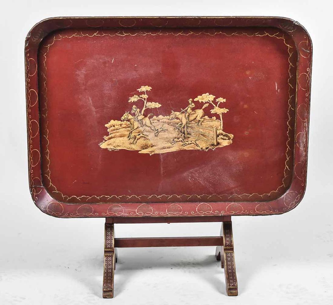 Red Lacquered Tray Table: Rectangular tray with rounded corners, decorated with an equestrian scene. Height 21 inches, width 30 inches, depth 22 inches. Notice to bidders: Condition reports and additional photographs are provi