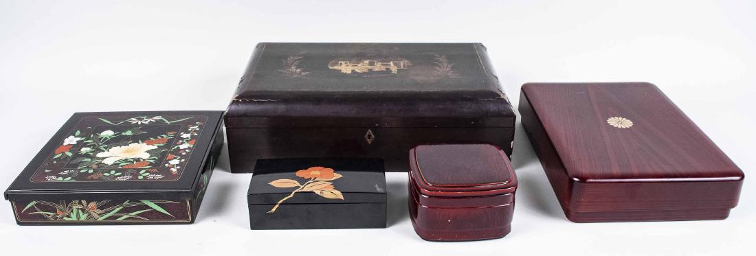 Group of Five Asian Style Boxes: Various styles, mostly lacquered boxes. Largest, height 5 inches, width 17 inches, depth 10 3/4 inches. Notice to bidders: Condition reports and additional photographs are provided by request as a cou