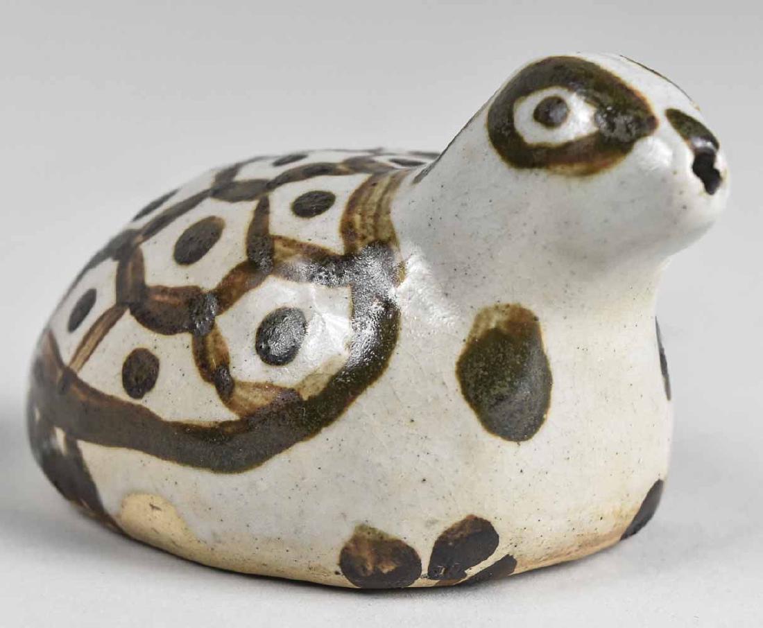 Korean Ceramic Tortoise Water Dropper: Height 2 1/2 inches. Notice to bidders: Condition reports and additional photographs are provided by request as a courtesy to our clients, as such any condition report is only an opinion and should no