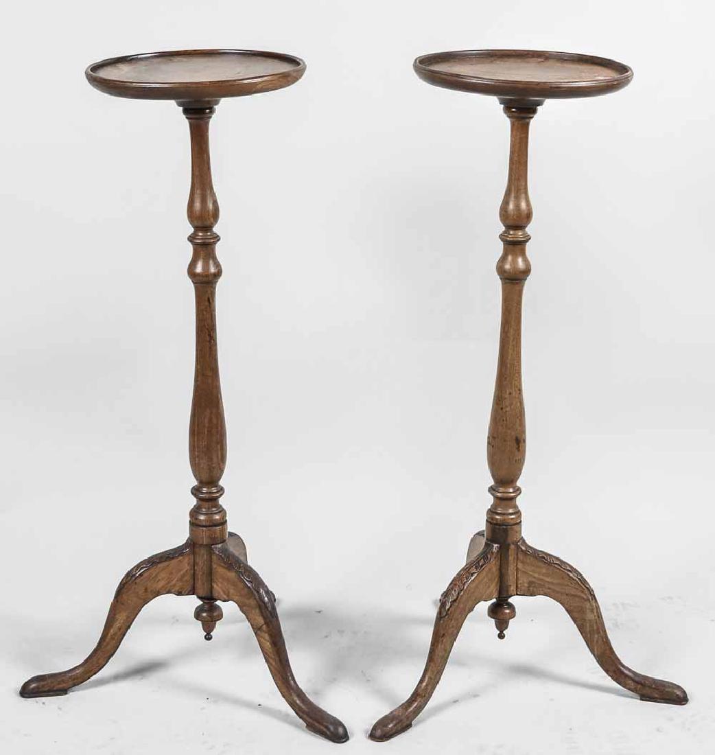 Pair of Fern Stands: Circular dish top stands with turned support on tripod base. Height 36 inches. Notice to bidders: Condition reports and additional photographs are provided by request as a courtesy to our clients, as