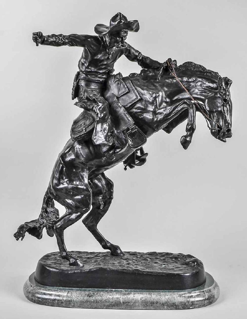 After Frederic Remington: The Bronco Buster. Bronze. Height 22 1/2 inches, overall height 24 inches. Notice to bidders: Condition reports and additional photographs are provided by request as a courtesy to our clients, as such