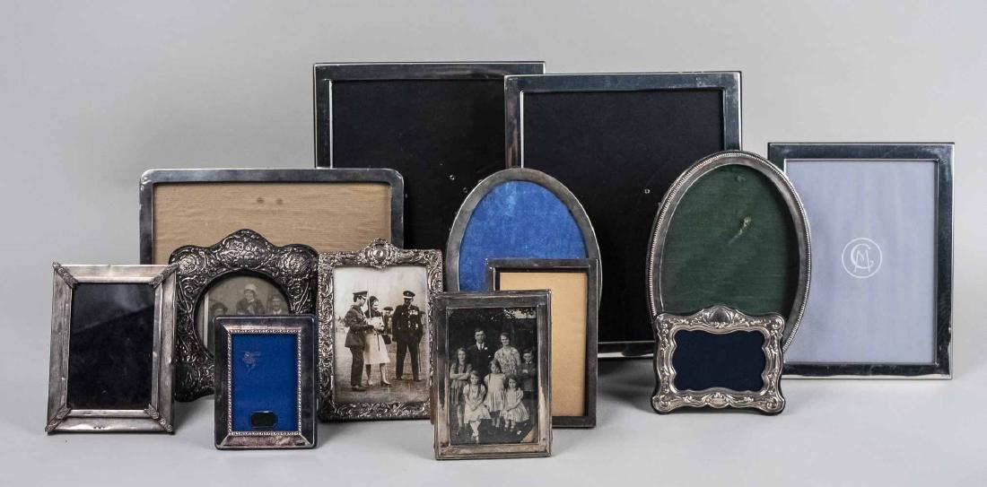Group of Ten Sterling Silver Picture Frames: Various makers and styles, including English and American frames; together with several silver plated picture frames. Largest sterling frame, holds 8 x 10 photograph. Notice to bidders: Condition repo