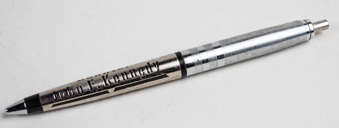 Senator John F Kennedy Pen: Sterling silver and chrome ball point pen, Length 5 1/8 inches. Notice to bidders: Condition reports and additional photographs are provided by request as a courtesy to our clients, as such any condit