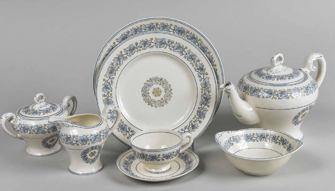 Staffordshire Dinner Service: Approximately seventy five pieces, Ivy Leaf pattern, comprising nineteen dinner plates, nine salad plates, twelve bread plates, six bowls, twelve fruit bowls, eight cups, eight saucers, creamer, sugar