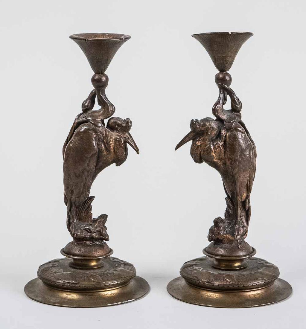 August Cain (French, 1821 - 1894): Modeled as herons on pedestals. Signed in the mold, A. Cain. Height, 9 inches. Notice to bidders: Condition reports and additional photographs are provided by request as a courtesy to our clients, as 