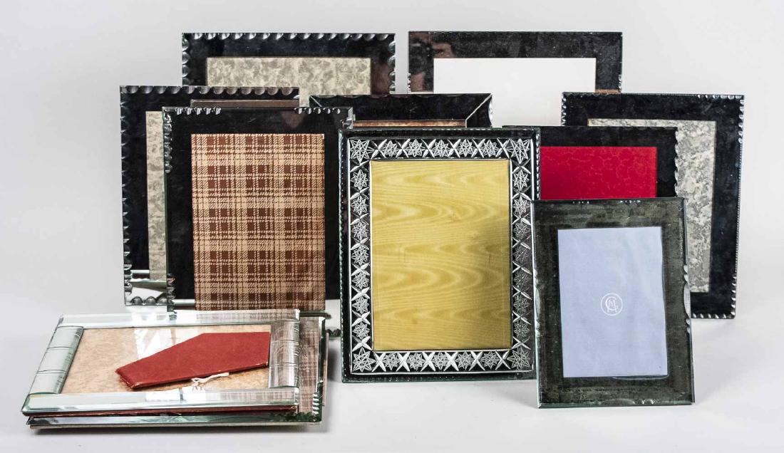 Group of Mirrored Picture Frames: Various makers and styles. Largest, holds 8 x 10 photograph. Notice to bidders: Condition reports and additional photographs are provided by request as a courtesy to our clients, as such any condition