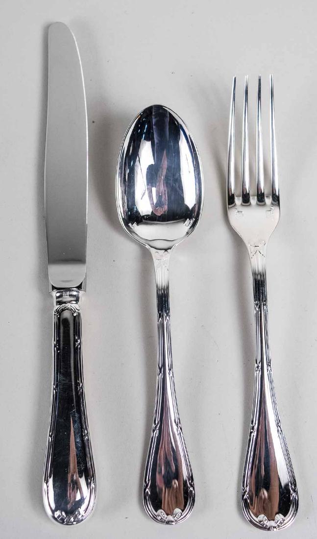 Christofle Silver Plated Flatware Rubans: Rubans pattern, comprising twelve oval soup spoons, two dinner knives, two dinner forks and two tablespoons. Notice to bidders: Condition reports and additional photographs are provided by request as