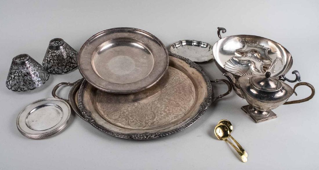 Group of Silver Plated Table Decorations: trays, candle shades, English teapot, Notice to bidders: Condition reports and additional photographs are provided by request as a courtesy to our clients, as such any condition report is only an opin