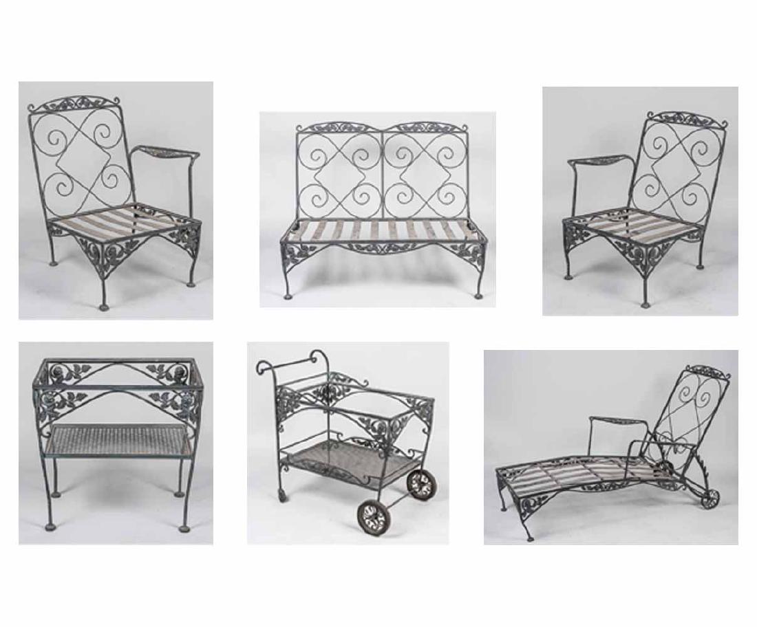 Green Metal Garden Furniture: Comprising two chairs, a settee, a table, a cart and a chaise longue. Height 34 inches, width 43 inches, depth 34 inches. Notice to bidders: Due to the nature of this particular online sale, the lots 